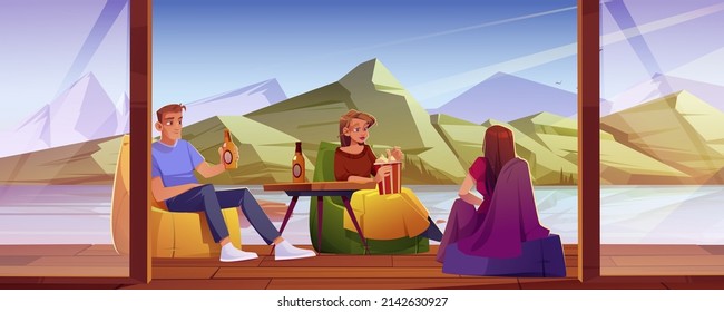 People relax on home terrace with view on lake and mountains. Friend resting on open wooden veranda sitting on chairs near table with popcorn, beer and blankets on weekend, Cartoon vector illustration