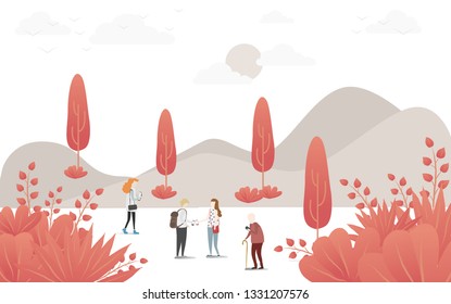 People relaxing in nature in a beautiful urban park, city skyline on the background
