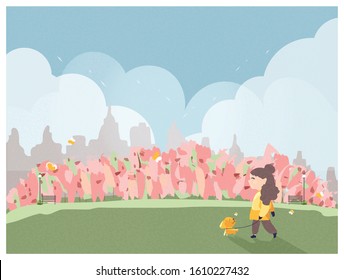 People relaxing in nature in spring or summer time at the park in the city. People outing to the park.Girl take a dog for a walk,butterfly and apple flower blossom.People in spring or summer concept.