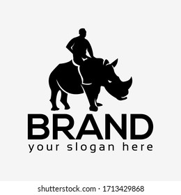 People rides on rhino, rhino logo. Flat design. Vector Illustration on white background