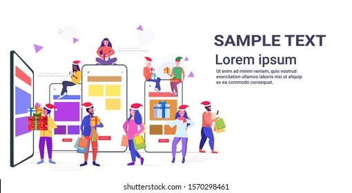 people in santa hats using mobile application mix race men women holding gift boxes online shopping concept christmas new year holidays celebration smartphone screen horizontal full length vector