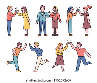 People are saying hello in a new way. People are making high fives and sharing positive emotions. flat design style minimal vector illustration.