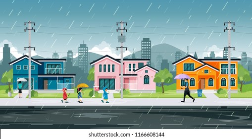 People and school children are walking home in the rain.