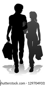 People silhouette of a young man and woman, probably a couple or husband and wife shopping holding retail bags