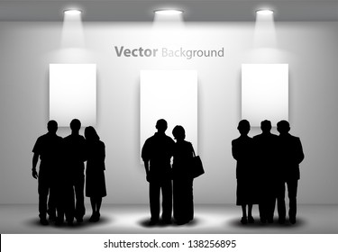 People silhouettes looking on the empty gallery wall with lights for images and advertisement. Ideal concept for promoting product or service.  Fully editable eps10
