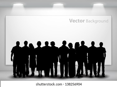 People silhouettes looking on the empty gallery wall with lights for images and advertisement. Ideal concept for promoting product or service.  Fully editable eps10