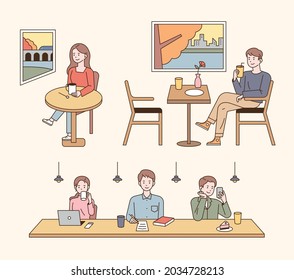 People sitting in cafe and drinking coffee. People watching the autumn scenery by the window or looking at books, laptops and smartphones at the bar table. outline simple vector illustration.