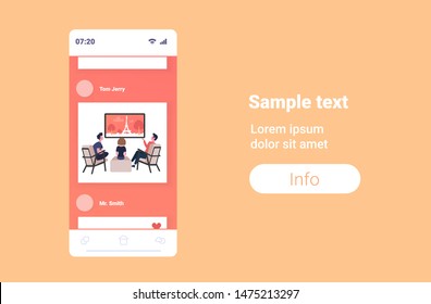 people sitting on chairs rear view friends watching famous landmarks tv travel show concept paris city silhouette on television smartphone screen mobile app full length horizontal copy space