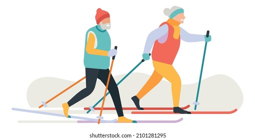 People skiing. Old couple walking on skis at winter