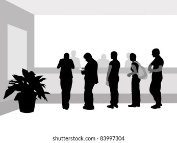 People stand in a row near cash desk