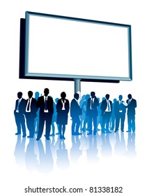 People are standing in front of a large billboard