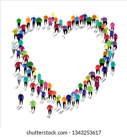 A lot of people standing in a shape of heart.