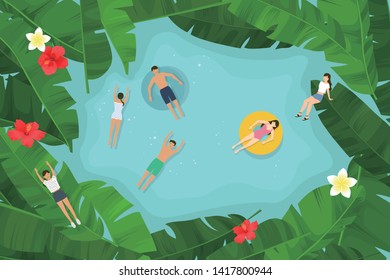 People swimming under palm trees.