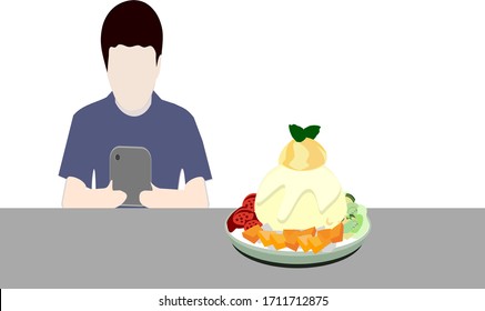 People taking pictures with mango ice cream and fruit topping