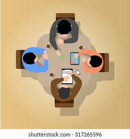  people team sitting and working together at the round table