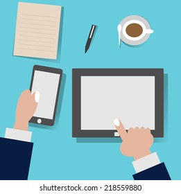 people use mobile and tablet on the working desk