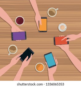 people using smartphone with coffee cup in the table