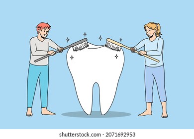 People using toothbrushes cleaning giant tooth take care of oral hygiene. Man and woman cleanse brush teeth. Caries protection. Oralcare, dental treatment concept. Flat vector illustration. 