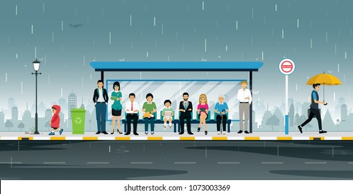 People are waiting at the bus stop when it rains.