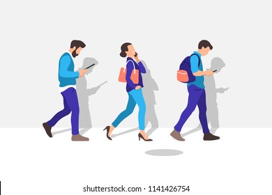 People walking on the street. They are using their digital devices. Vector illustration.