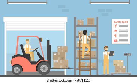 People in warehouse. Interior with trucks and people.