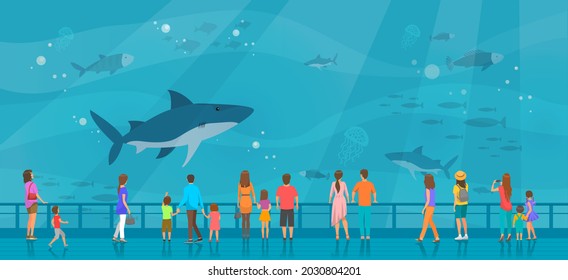 People watching underwater scenery with sea animals in oceanarium. Underwater fauna with fish, seaweed, whale, jellyfish. Marine world representatives. Oceanarium visitors look at fish in aquarium