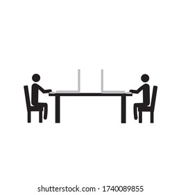 People work on laptops. Social distancing. Keep a distance of 2 meters. Prevention of coronavirus. Covid-19.