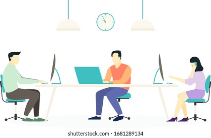 Mitarbeiter im Büro mit Laptop und Computer