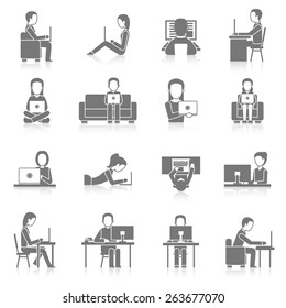 People working on computer sitting and laying black icons set isolated vector illustration