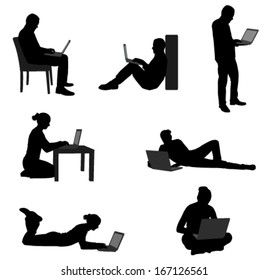 people working on their laptops silhouettes