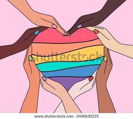 People's hands folded into rainbow pride heart silhouette. Happy pride day. LGBTQ Pride Month