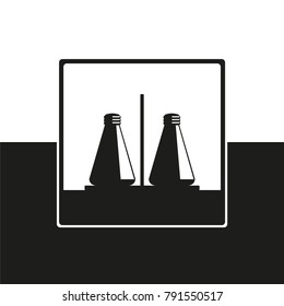 Pepper and salt shaker. Vector icon in black and white form.