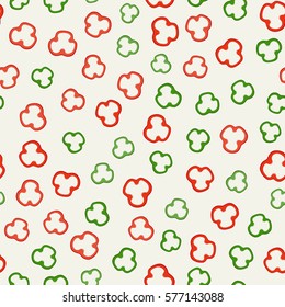 Pepper slices seamless pattern. Vector background with cut red and green peppers.