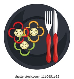 peppers in dish with fork and knife