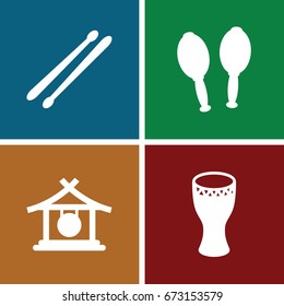 Percussion icons set. set of 4 percussion filled icons such as gong, maracas, drum stick