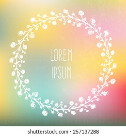 Perfect hand drawn frame on a blured vector background with a place for your text. Circle natural wreath for invitation cards, save the date, wedding card design. 
