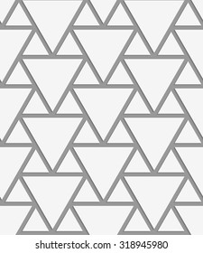 Perforated big and small triangles.Seamless geometric background. Modern monochrome 3D texture. Pattern with realistic shadow and cut out of paper effect.