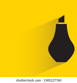 perfume bottle with drop shadow yellow background
