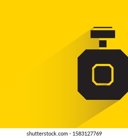 perfume bottle with drop shadow yellow background