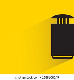 perfume bottle with drop shadow in yellow background