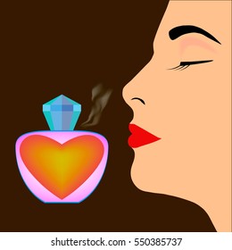 Perfume bottle and profile of woman's face on dark background