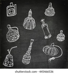 Perfume bottles set. Hand drawn vector stock illustration. Chalk board drawing.