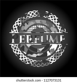 Perfume on grey camo texture