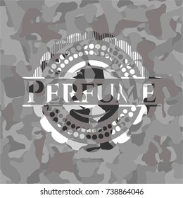 Perfume on grey camouflaged pattern