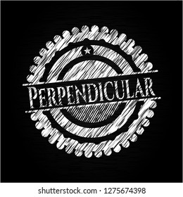 Perpendicular chalk emblem written on a blackboard