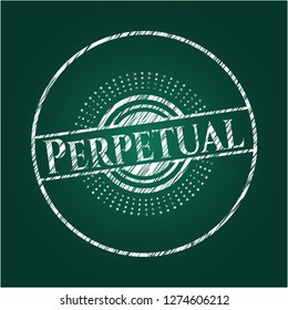 Perpetual chalkboard emblem written on a blackboard