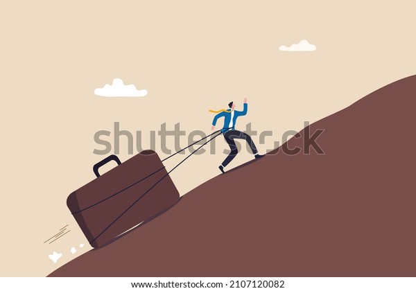 Persistence, effort and motivation to be success,\
challenge, overcome difficulty and achieve target, hard work,\
endurance and practice concept, strong businessman drag big\
business briefcase\
uphill.