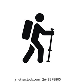 A person with a backpack and walking stick