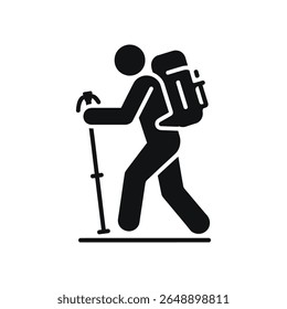 A person with a backpack and walking stick