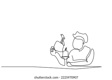 person burns the paper in his hand with a candle fire flames come out